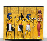 Close-up detail of the Anubis carving on the Egyptian museum reproduction wall relief