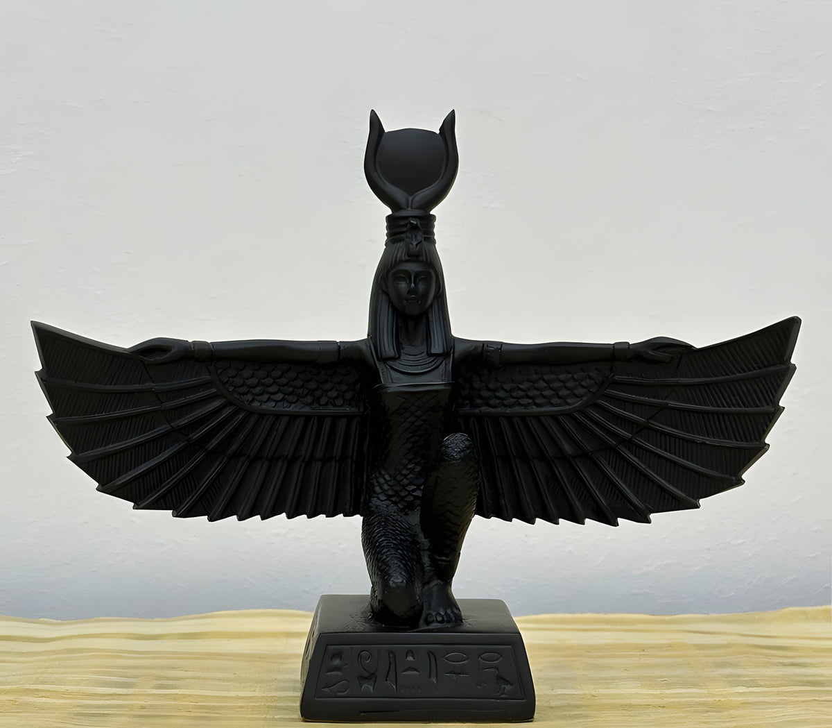 Close-up of black finish detail on Isis statue