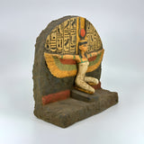 Close-up of Isis statue crown and headdress detail