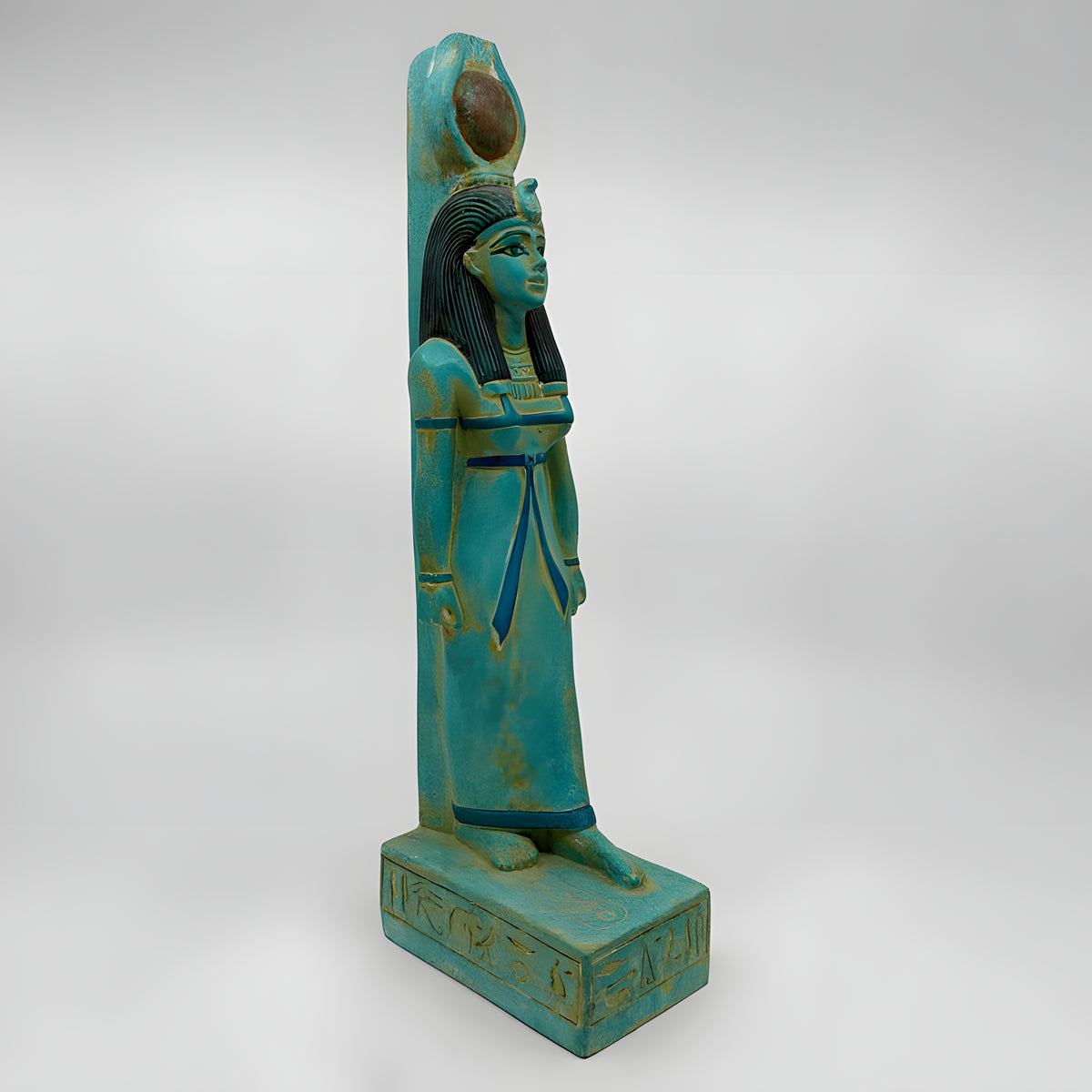 Side view of green stone Hathor statue replica
