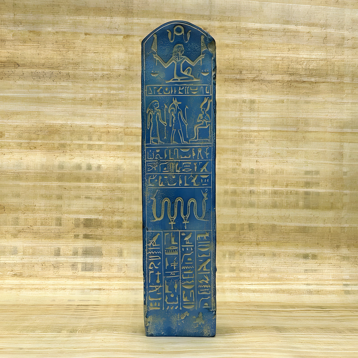 Side view of grey stone Hathor statue replica