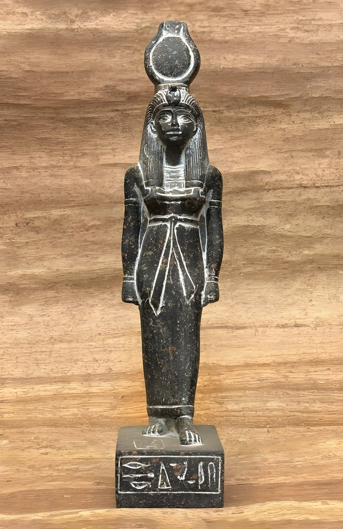 Close-up of Hathor statue crown detail on granite