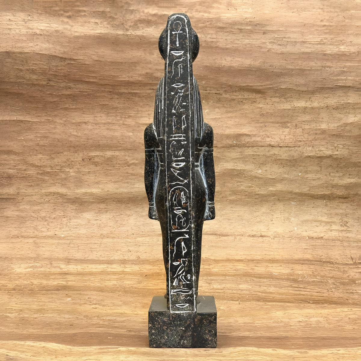 Side view of granite Hathor statue replica