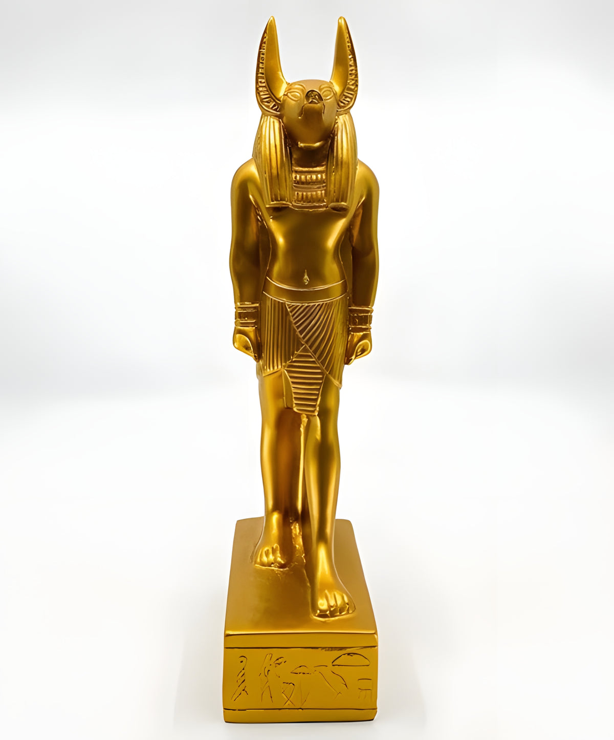 Close-up of jackal head detail on golden Anubis statue
