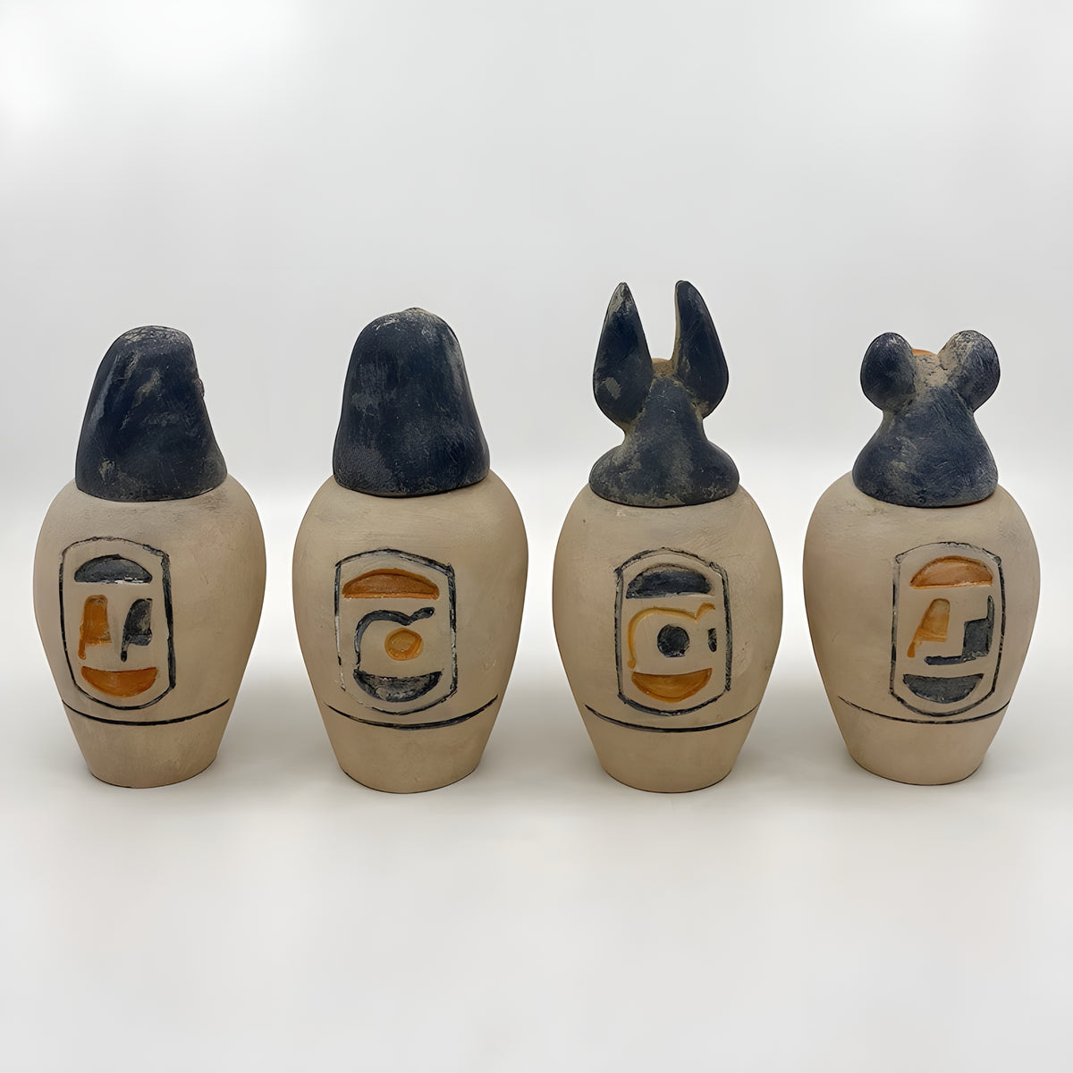 Set of canopic jars with Sons of Horus heads