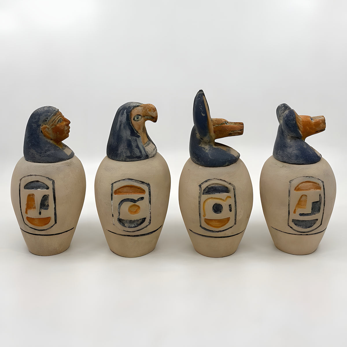 Side view of limestone canopic jars replica