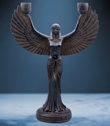 Close-up of candle holder detail on Isis statue