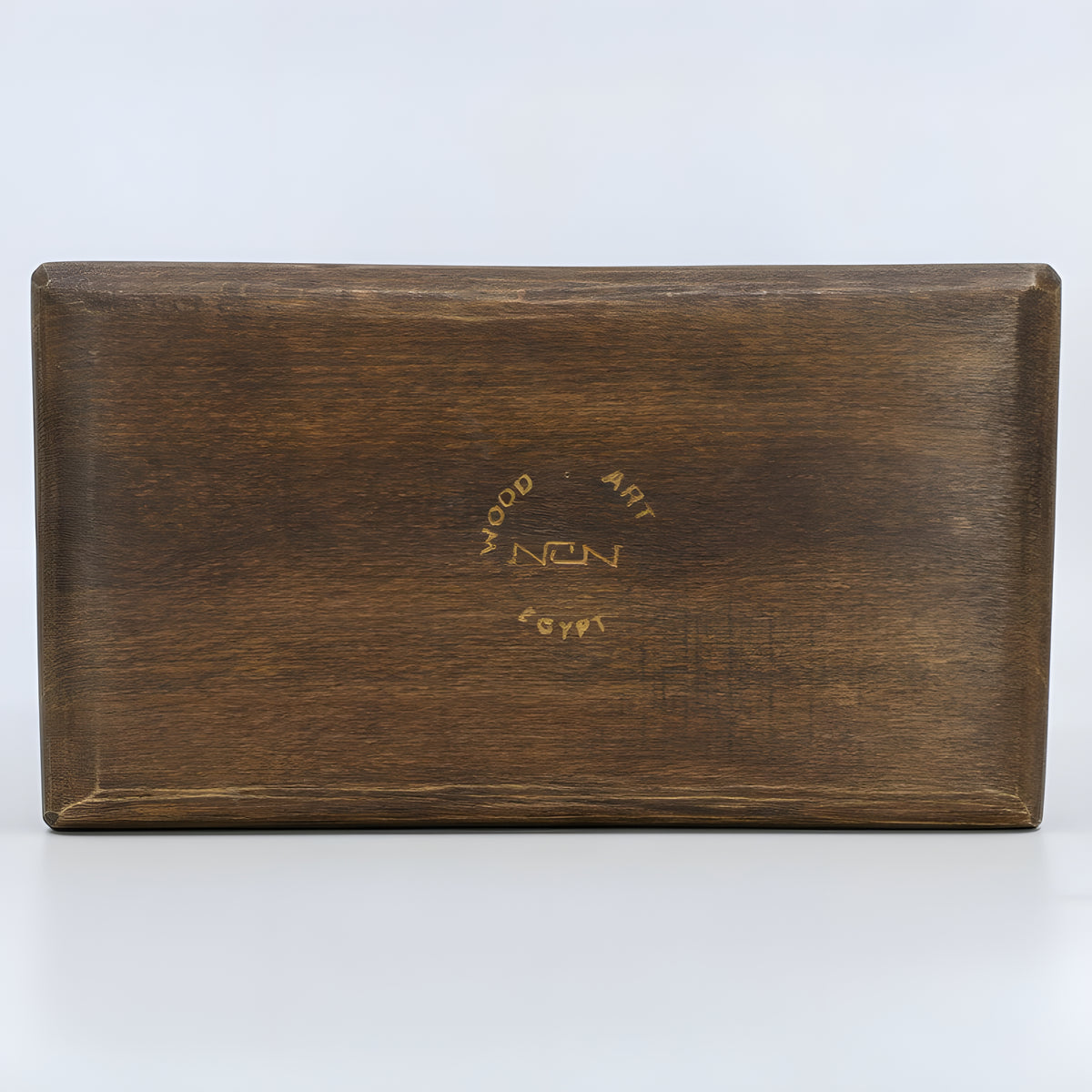 Close-up of Isis carving on wooden jewelry box