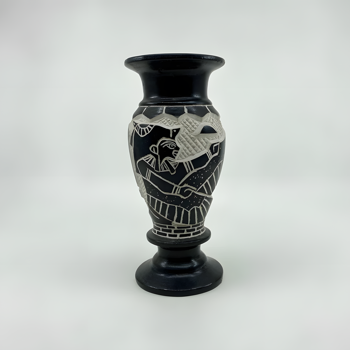 Side view of Isis basalt vase replica