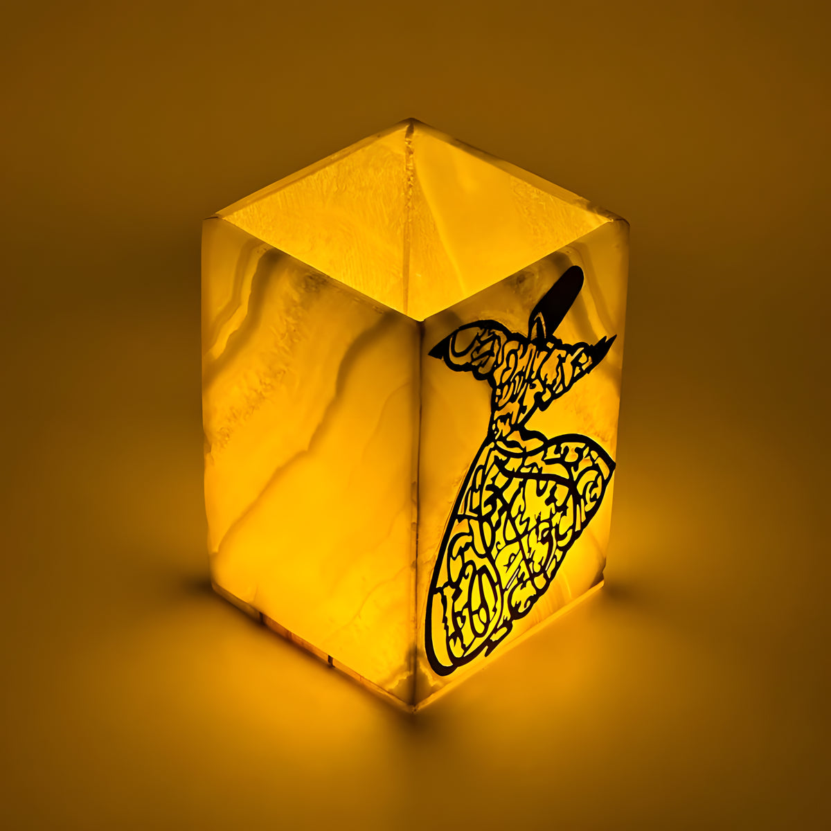Side view of Egyptian vase lamp replica lit