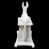 Side view of small alabaster Anubis statue replica