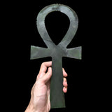 Close-up of carved detail on green Ankh replica