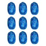Close-up of scarab bead hieroglyphic detail