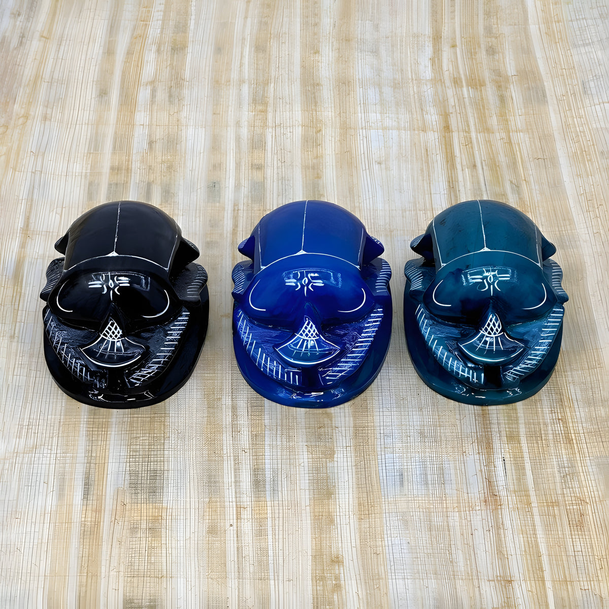 Set of three handmade Egyptian scarab beetle amulets, polystone