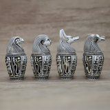 Side view of canopic jars set replica