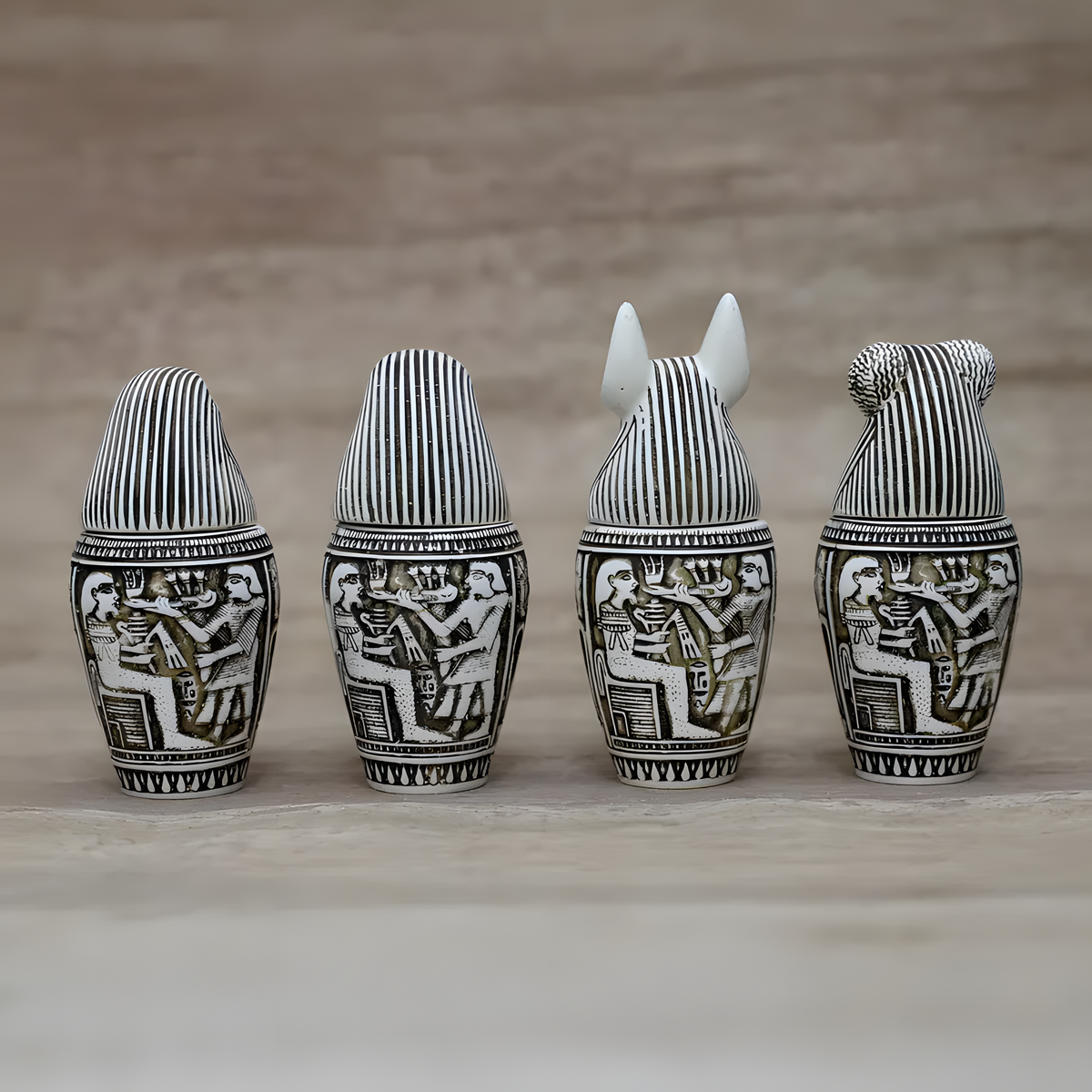 Front view of canopic jars museum reproduction