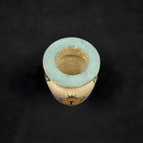 Side view of alabaster scarab vase replica