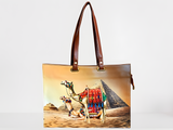 Close-up of camel and pyramid artwork on tote bag