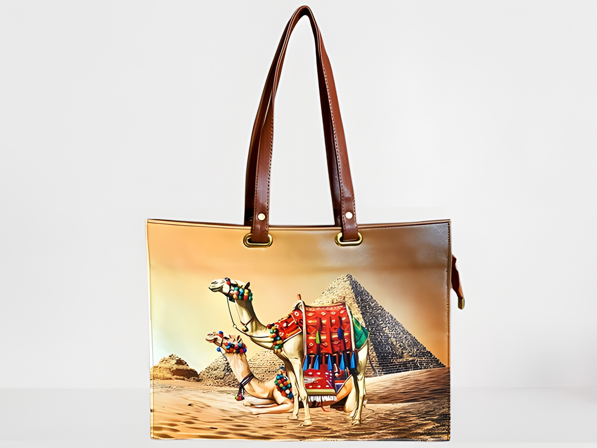 Close-up of camel and pyramid artwork on tote bag