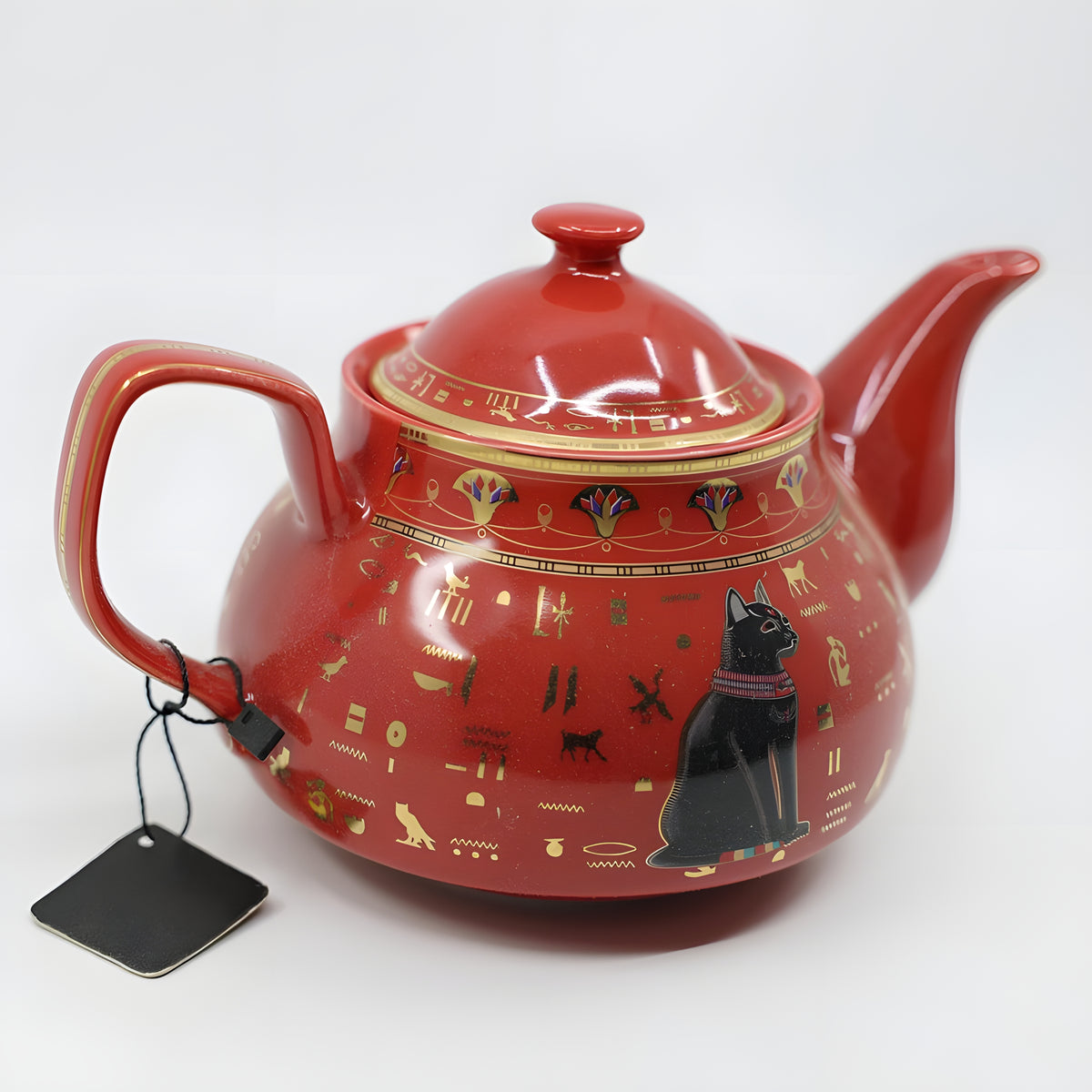 Close-up of Bastet painting on teapot