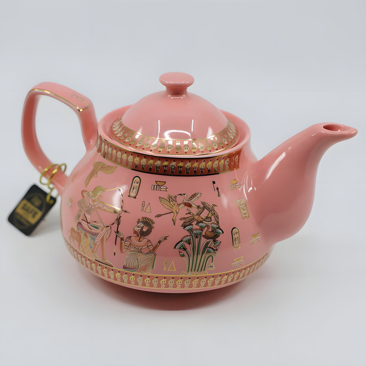 Close-up of couple painting on teapot