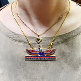 Close-up of the handmade Isis pendant showing carved wing and headdress detail