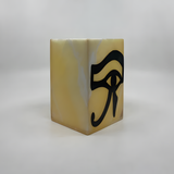 Close-up of the carved Eye of Horus symbol on the alabaster vase