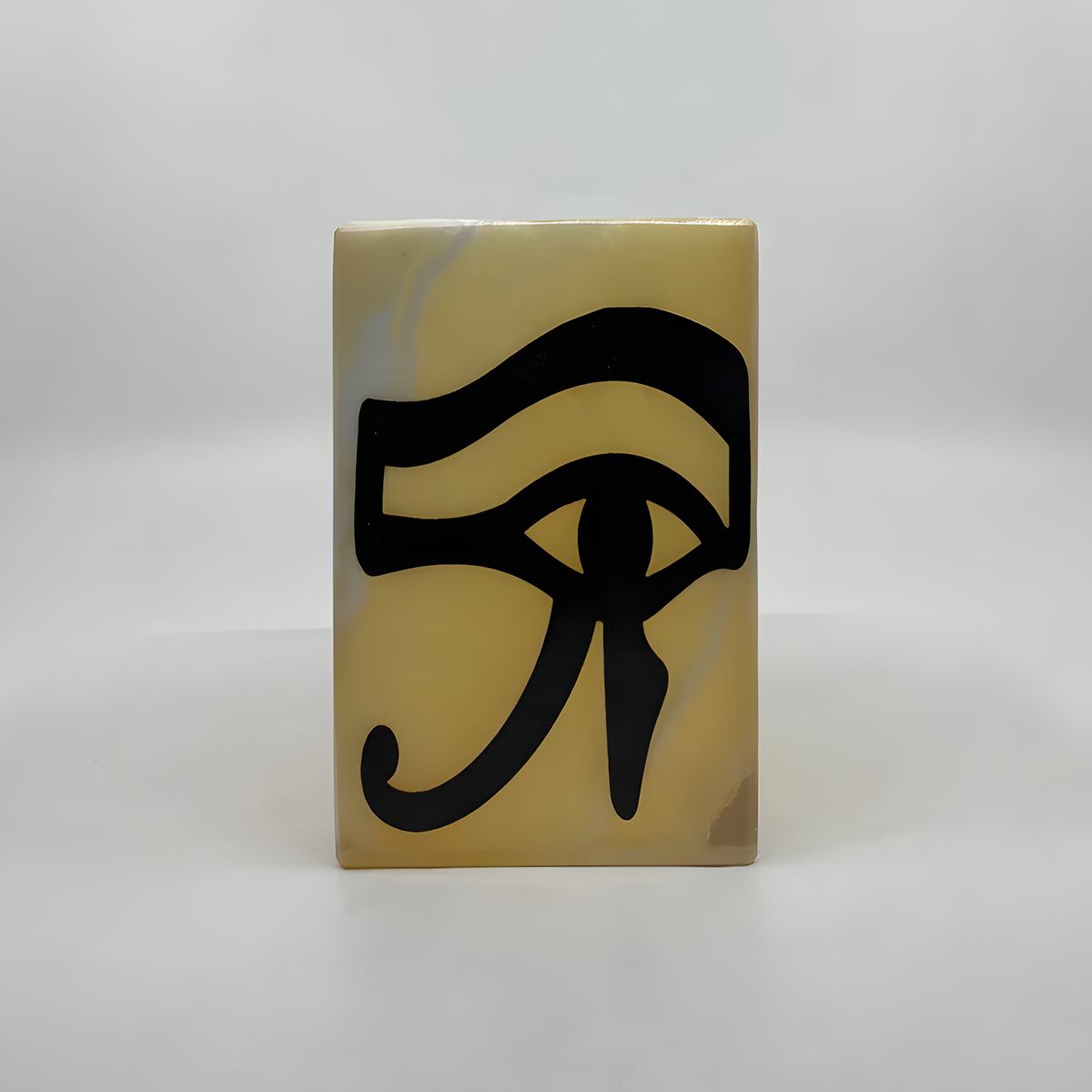 Side view of the handcarved alabaster night light vase showing natural stone texture