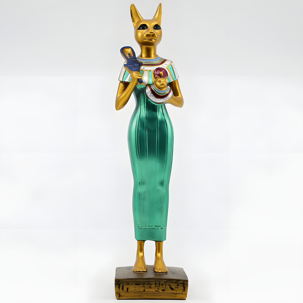 Bastet statue museum reproduction, close-up of the carved cat head and sistrum detail