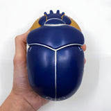 Handmade Egyptian jewelry box in polystone with a golden oval shape and blue scarab lid