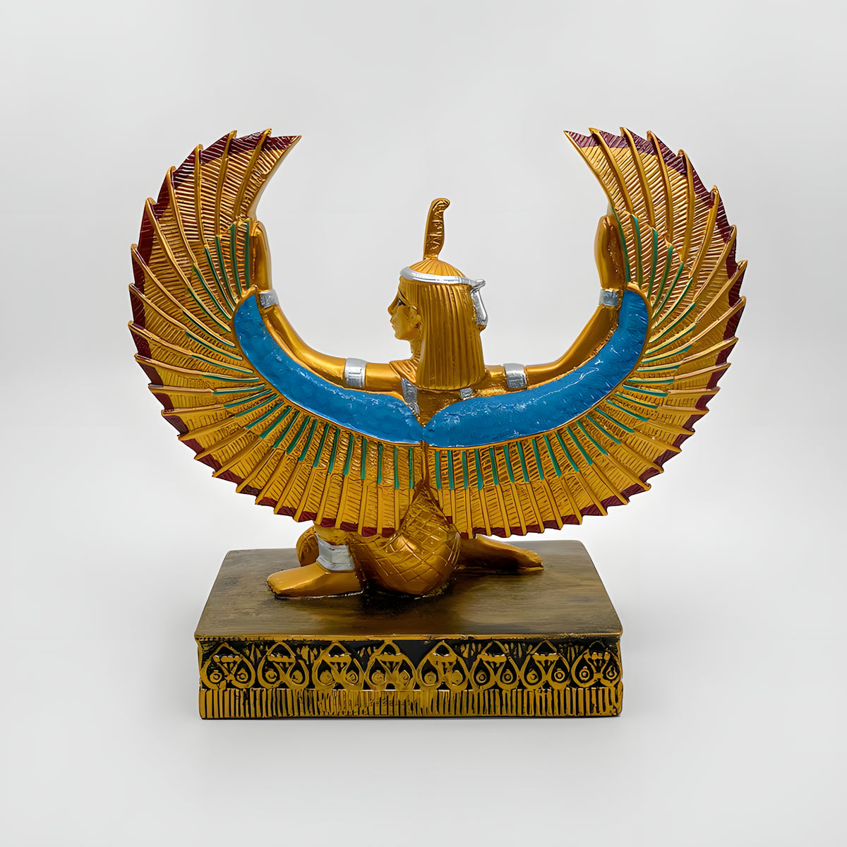 Ma'at statue museum reproduction, close-up of the carved face and headdress feather
