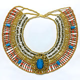 Close-up of the scarab amulet centerpiece on the beaded collar
