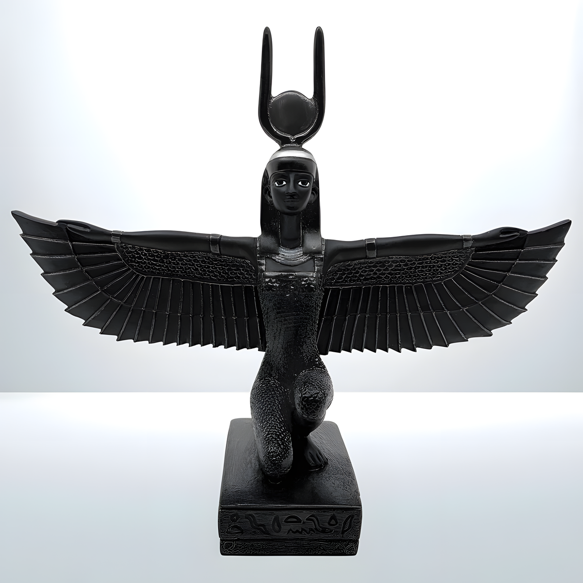 Winged Isis statue museum reproduction, close-up of the carved face and headdress