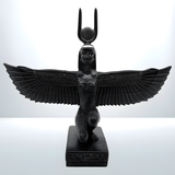 Winged Isis statue museum reproduction, close-up of the carved face and headdress