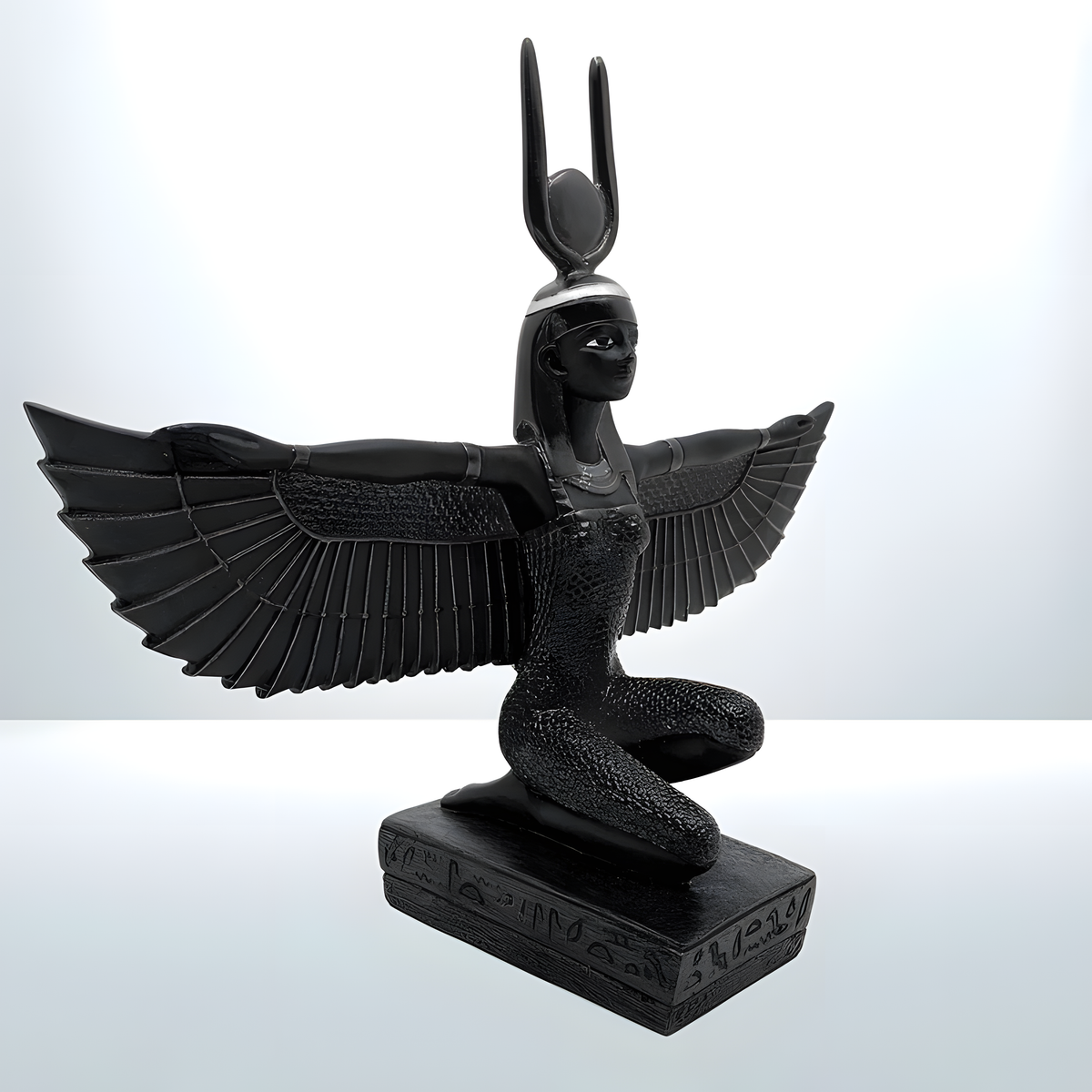 Winged Isis statue museum reproduction, side profile view