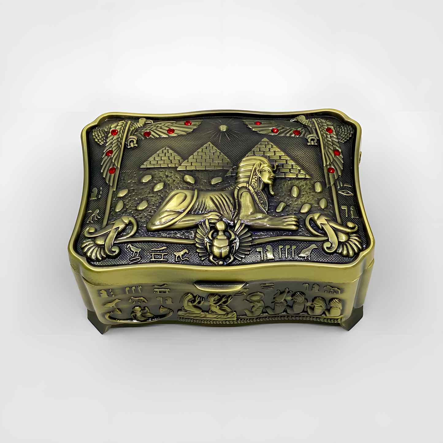 Egyptian Sphinx metal jewelry box shown from a side angle