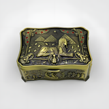Egyptian Sphinx metal jewelry box shown from a side angle