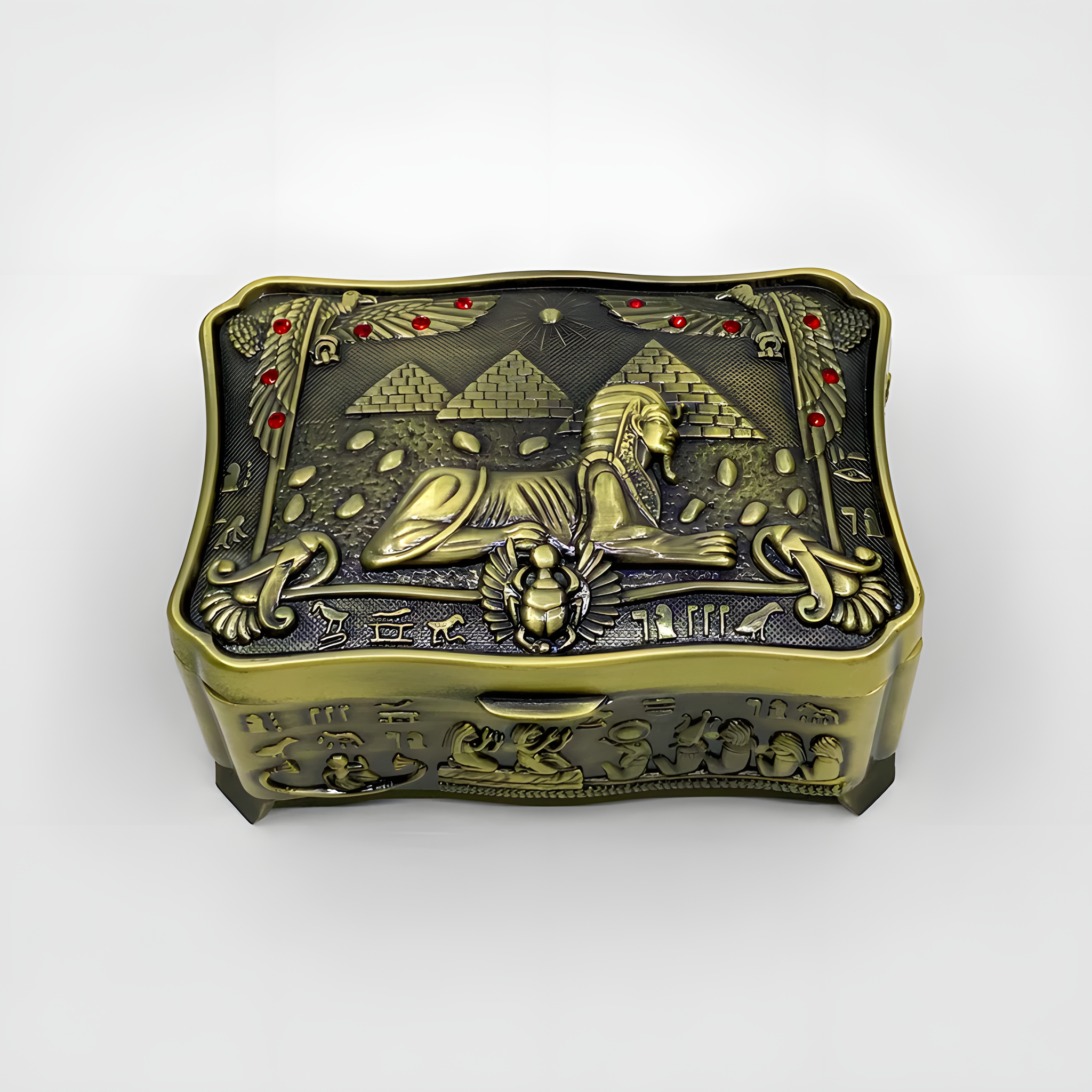 Egyptian Sphinx metal jewelry box shown from a side angle