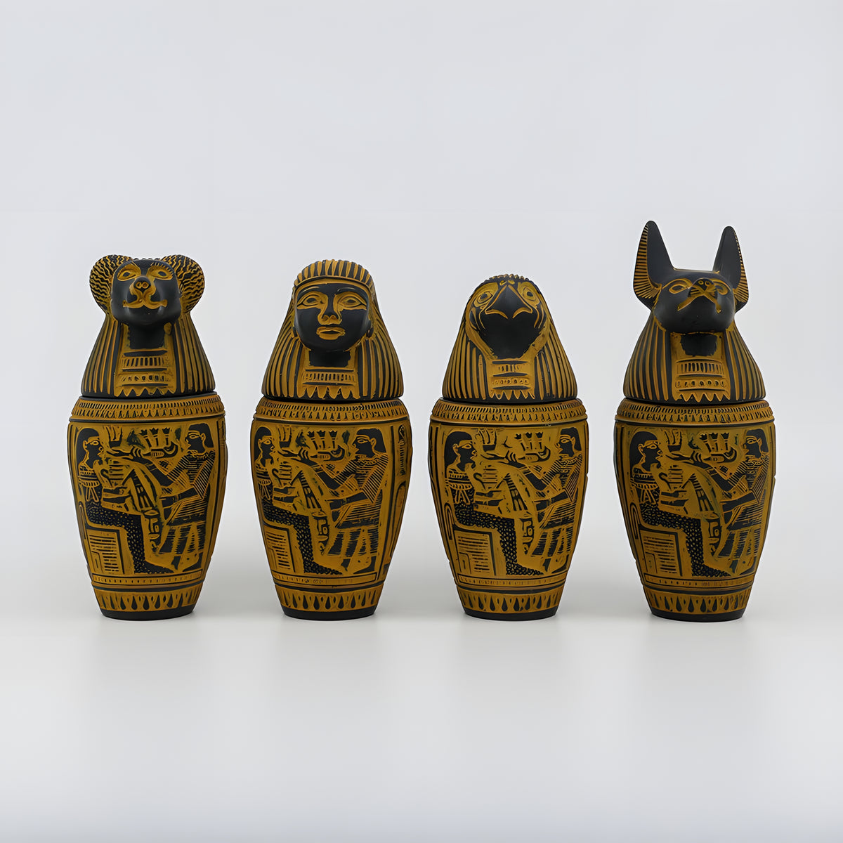 Egyptian canopic jars set, museum reproduction — full set front view