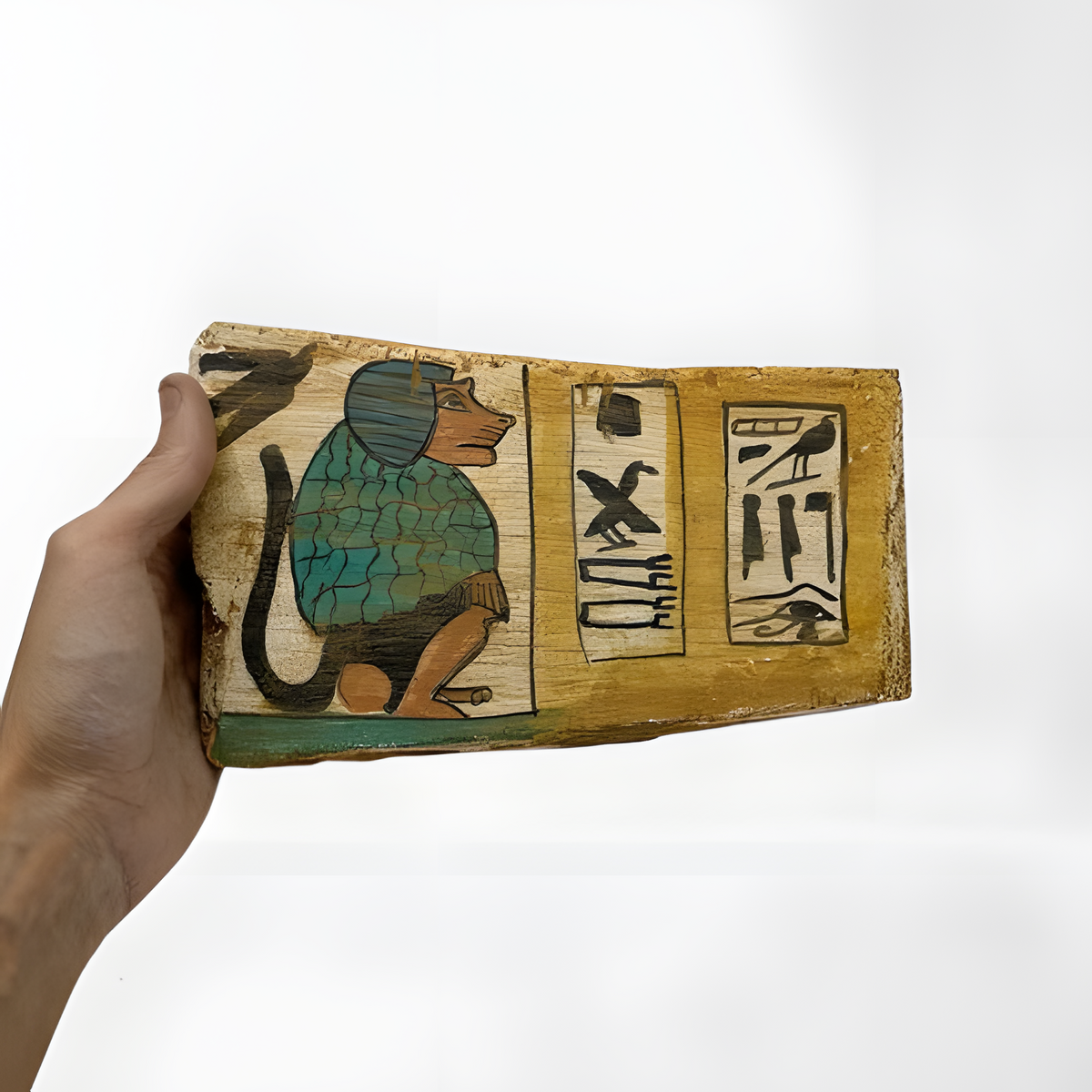Handmade wooden palette depicting the Egyptian baboon god Babi, museum reproduction, front view