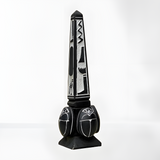 Black stone Egyptian obelisk museum reproduction with hand-carved hieroglyph and scarab motifs