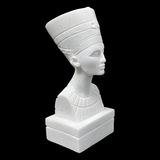 Close-up of the Nefertiti bust museum reproduction showing crown and jewel detail