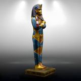 Side view of the hand-painted King Tutankhamun statue, museum reproduction