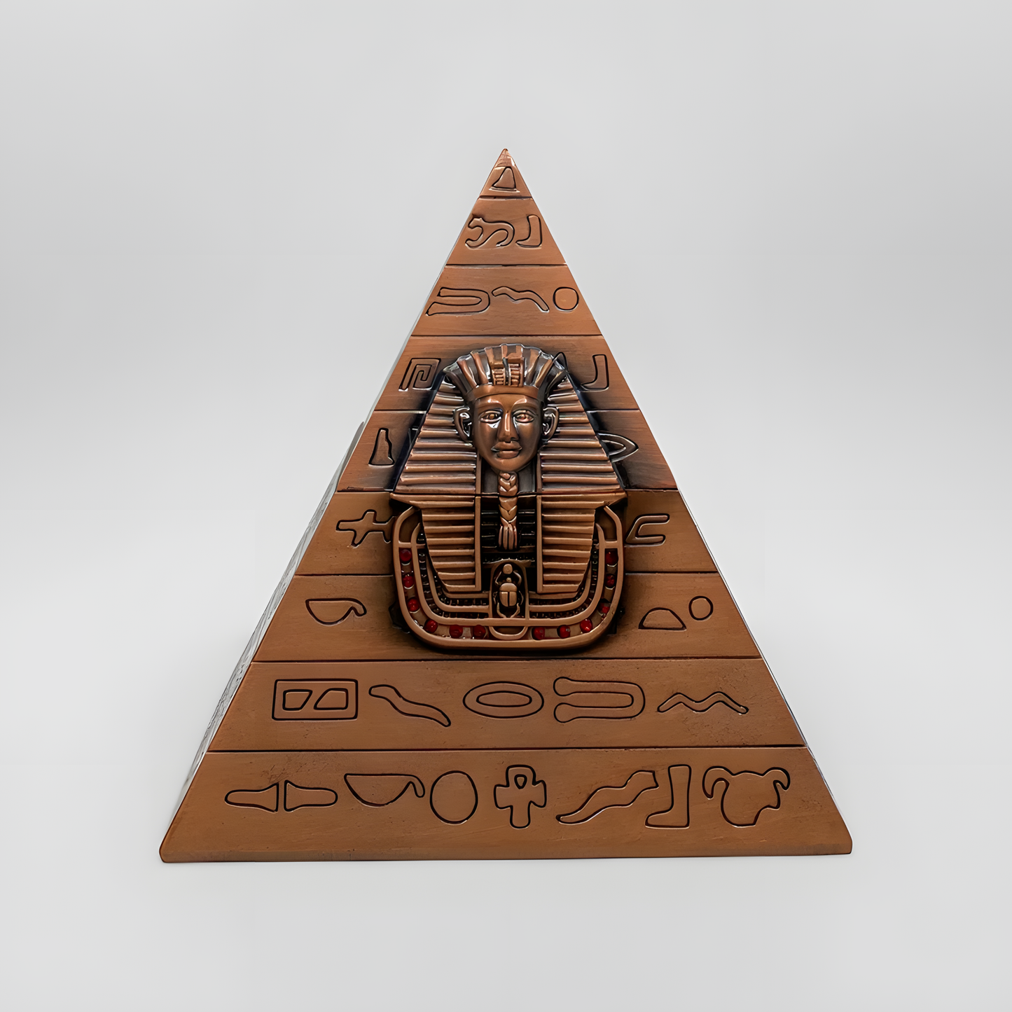Egyptian pyramid jewelry box shown open with the interior storage space visible