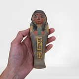 Baby Horus statue, museum reproduction, front view