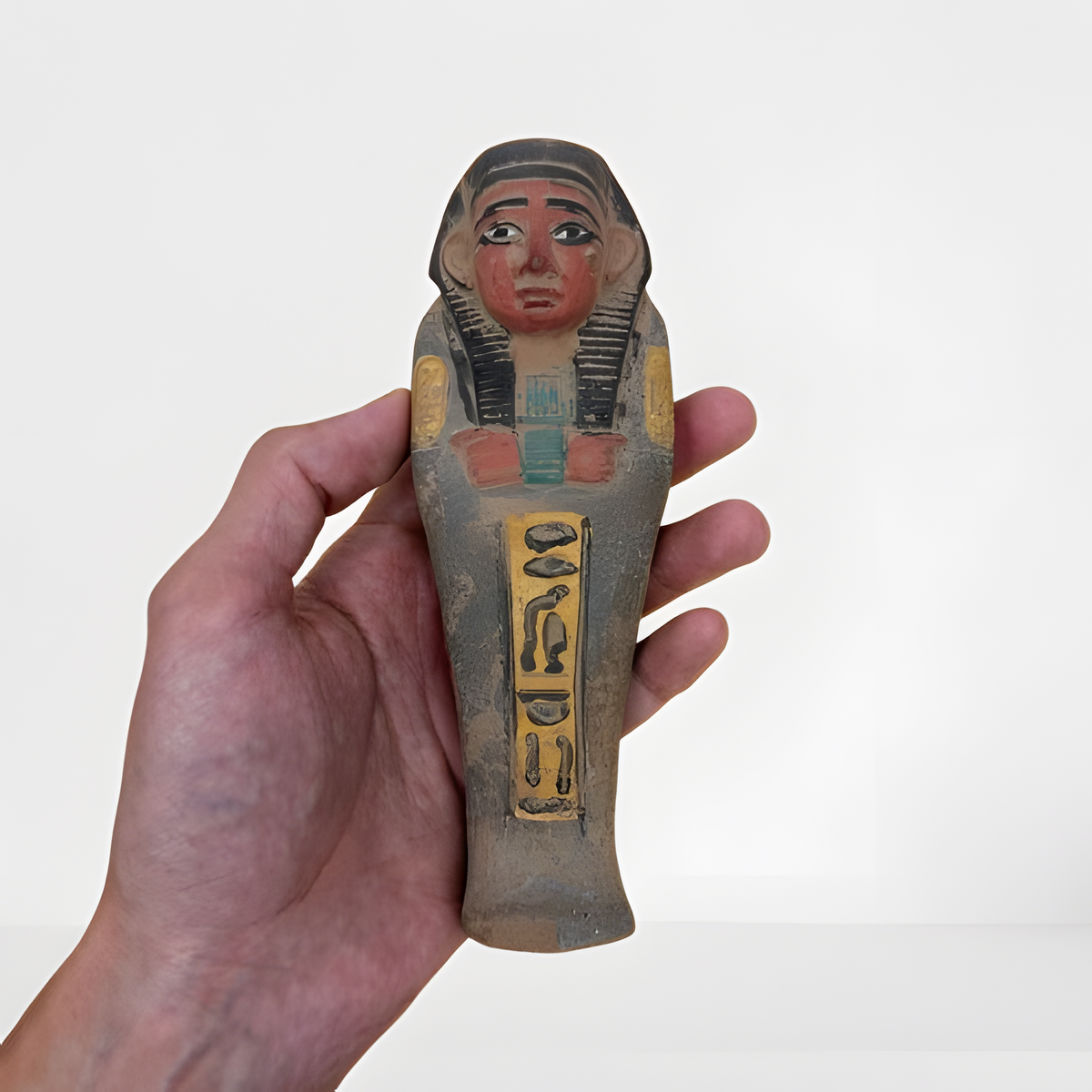 Baby Horus statue, museum reproduction, front view