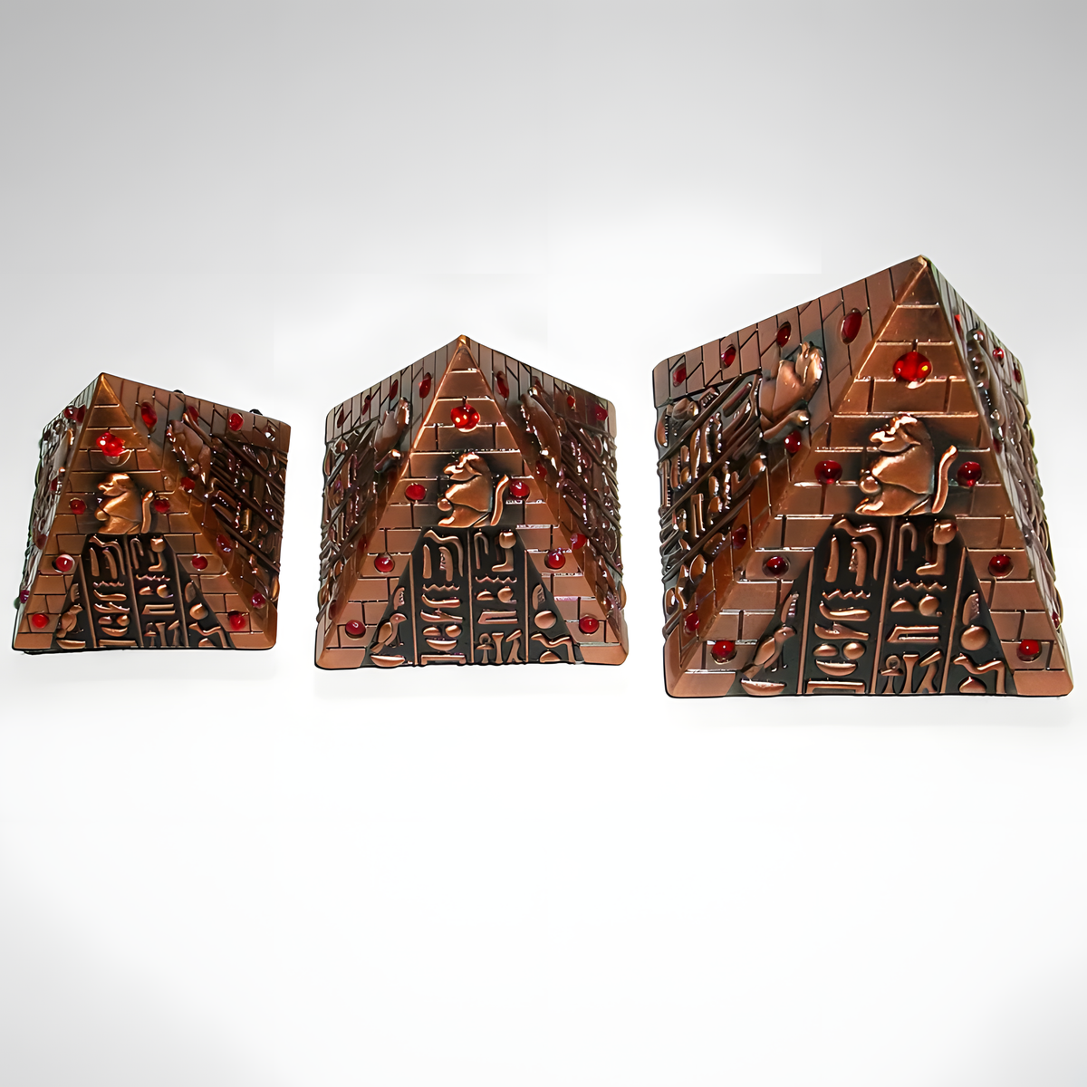 Close-up of one copper pyramid from the Egyptian Baboon God pyramid set, museum reproduction