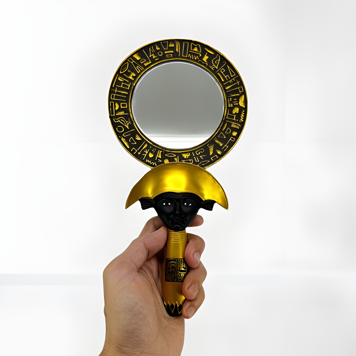 Egyptian Hathor mirror, museum reproduction — side view showing depth