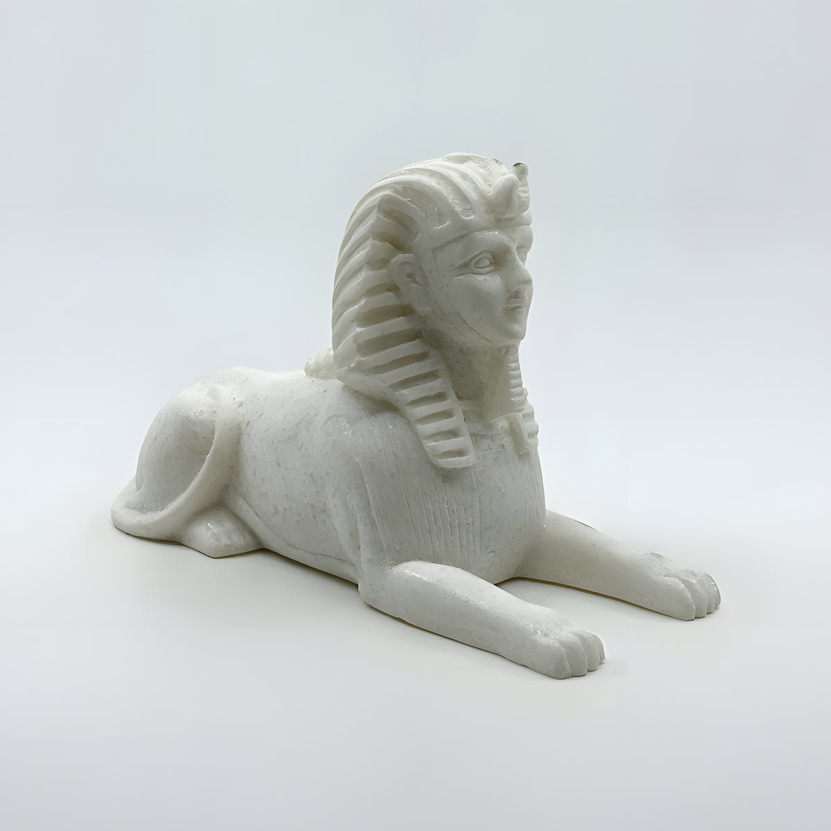 Close-up of the Sphinx of Giza museum reproduction showing carved detail