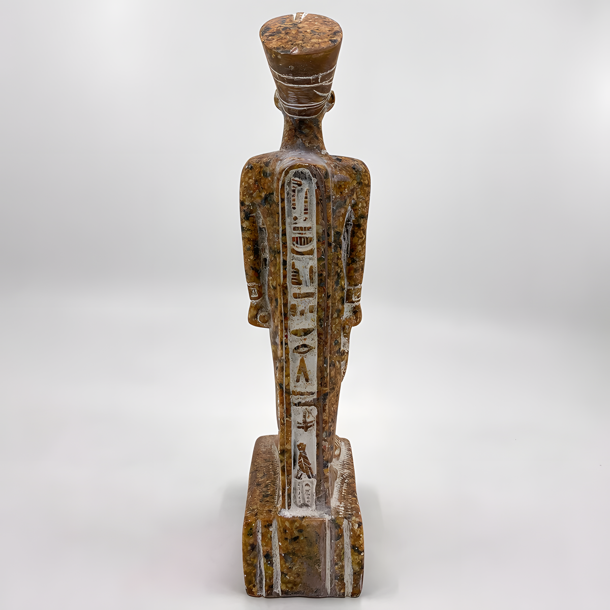 Back view of the granite Nefertiti statue museum reproduction